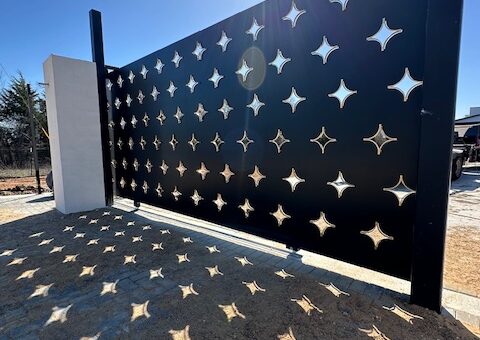 custom metal slide gate with diamond shaped accents